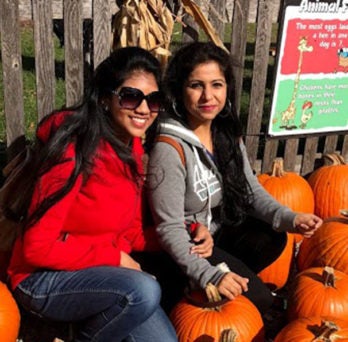 UIC international students select pumpkins at Seigel's Cottonwood Farm. 