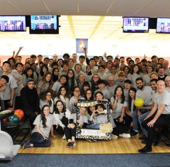 Student and staff celebrate 40 years of TIE at the UIC Bowling Alley.
                  