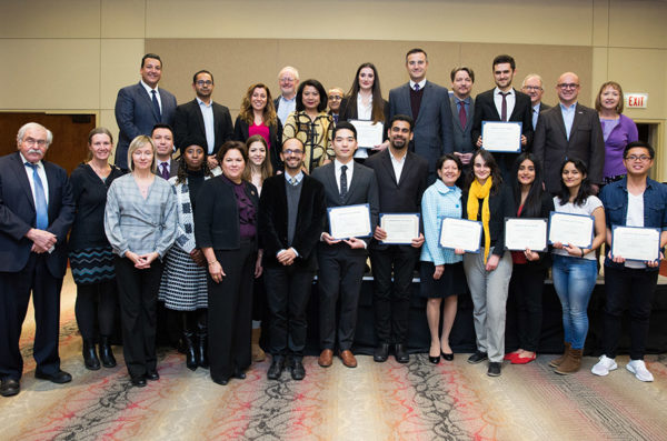 Members of the Chicago Consular Corps pose with UIC student scholarship winners.