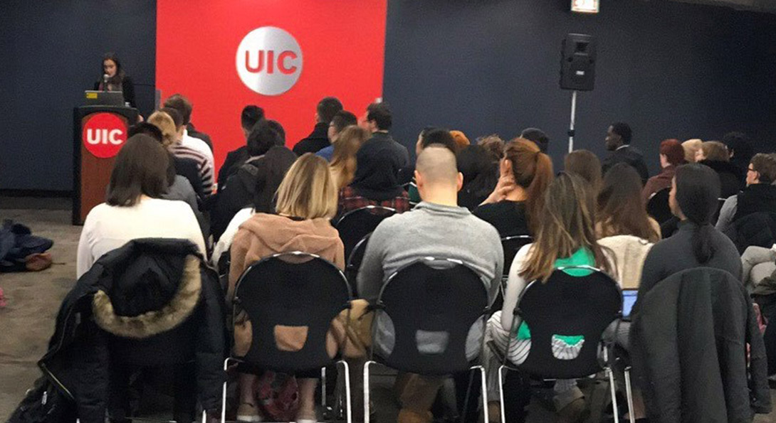 UIC students listen to a presentation given by the Consul General of Argentina.