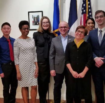 Students and faculty posing at the Residence of Consul General of France
                  