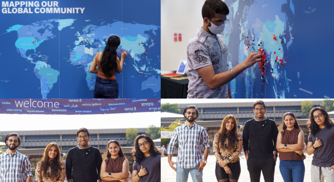 Students place their pins on the Global Community Map. The Global Ambassadors pose in front of the large multi-lingual welcome banner in the Quad.