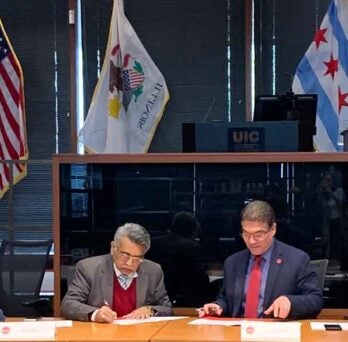 UIC Chancellor Javier Reyes and SPA Director P.S.N. Rao sign a memorandum of agreement
                  